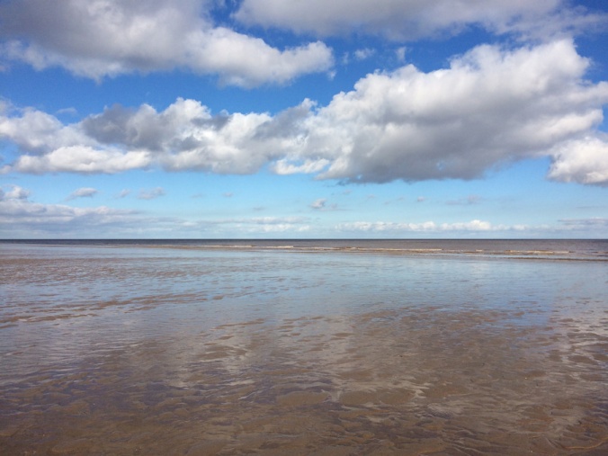 Deserted Anderby Creek beach and a blue, blue sky.